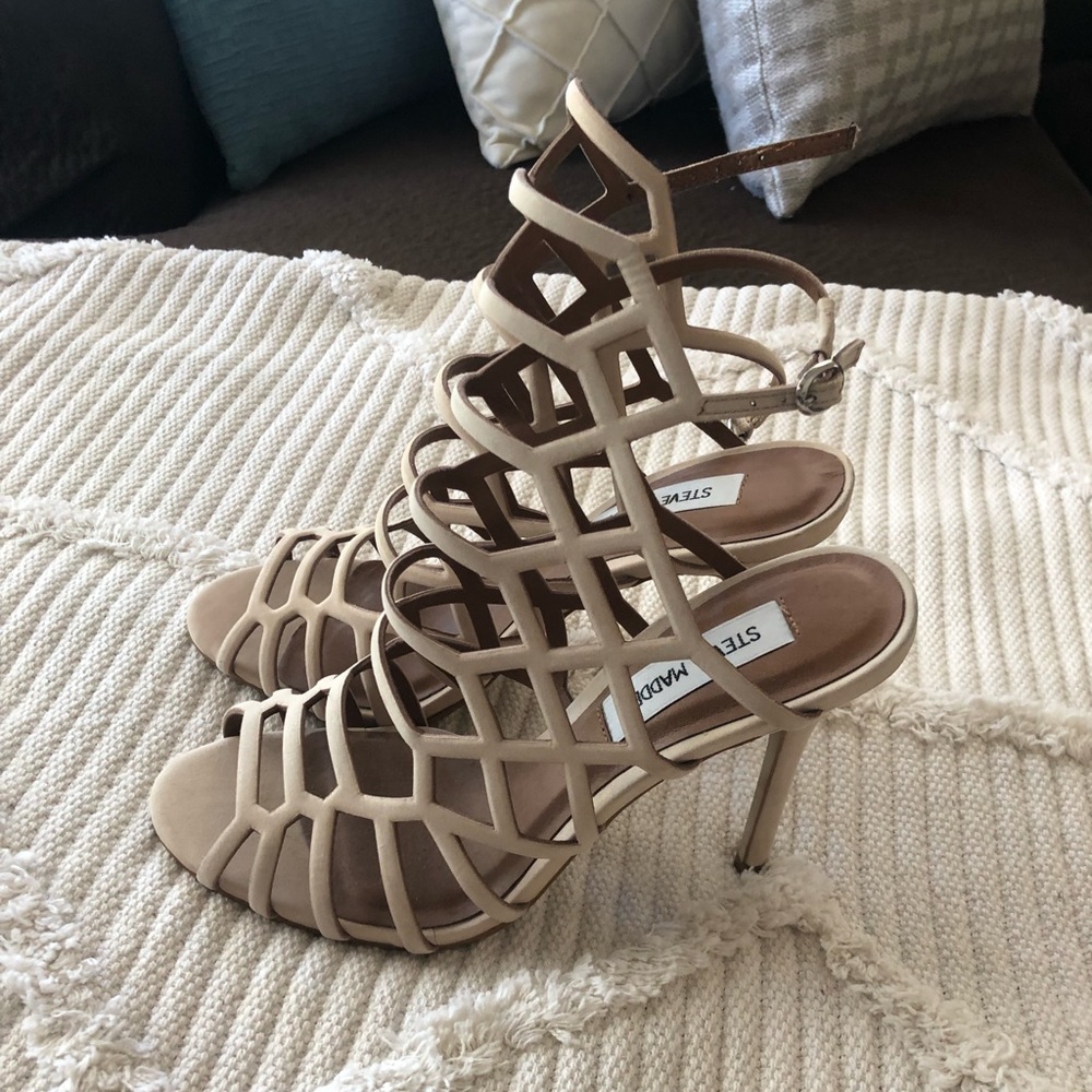 Never worn Steve Madden Slither heels.